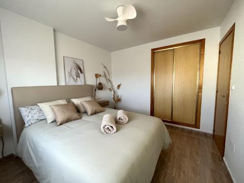 Giường trong phòng chung tại Salty Apartment Torrevieja