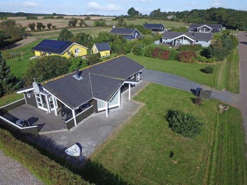 an overhead view of a house with a yard at Holiday Home Sondra - 250m from the sea in SE Jutland by Interhome in Børkop