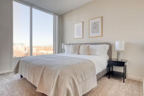 a bedroom with a bed and a large window at San Jose 1BR w Gym Pool nr 280 SFO-751 in San Jose