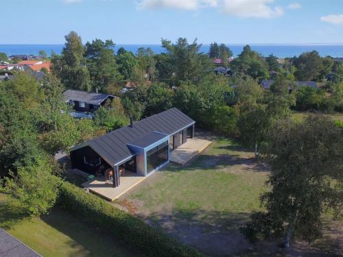 an overhead view of a house with a roof at Holiday Home Yukon - 150m from the sea in SE Jutland by Interhome in Odder