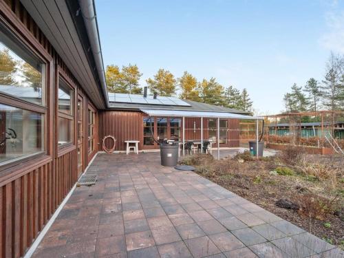 a building with a walkway next to a building at Holiday Home Toska by Interhome in Silkeborg