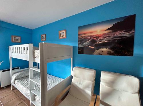 Postel nebo postele na pokoji v ubytování Apartamento Portosin con piscina al lado de la playa