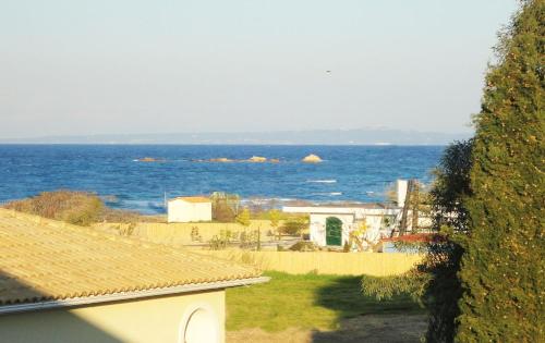 a view of the ocean from a house at HELEN STUDIOS Loft in Plános