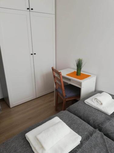 Ένα ή περισσότερα κρεβάτια σε δωμάτιο στο Apartamencik Perełka
