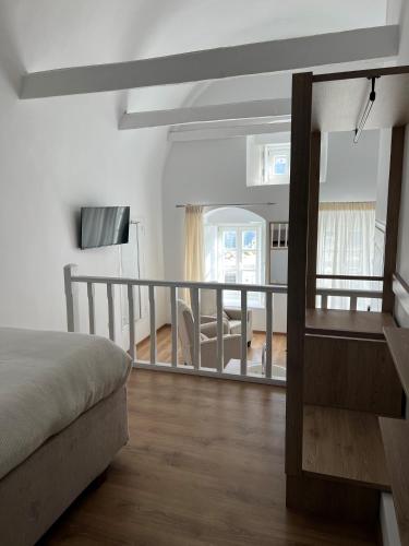 Postel nebo postele na pokoji v ubytování Douskos Port House