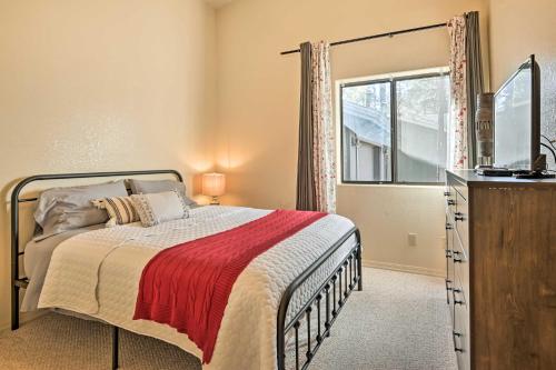 a bedroom with a bed and a window and a dresser at Near Hiking and Golfing Pinetop Home with Deck! in Indian Pine