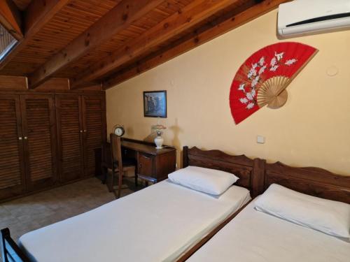 Postel nebo postele na pokoji v ubytování Atisis Apartments