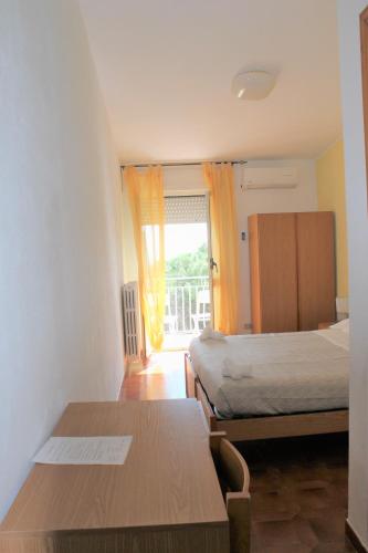 Postel nebo postele na pokoji v ubytování Piccolo Hotel Nuova gestione