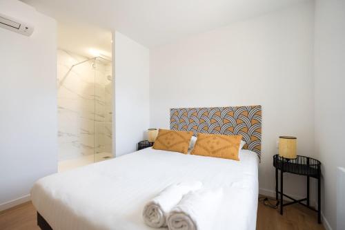 Postel nebo postele na pokoji v ubytování MaisonMars - Complexe Les Maisons du Parc 30 p.