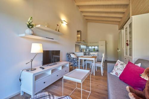 a living room with a couch and a table at Alb Appartements in Albstadt