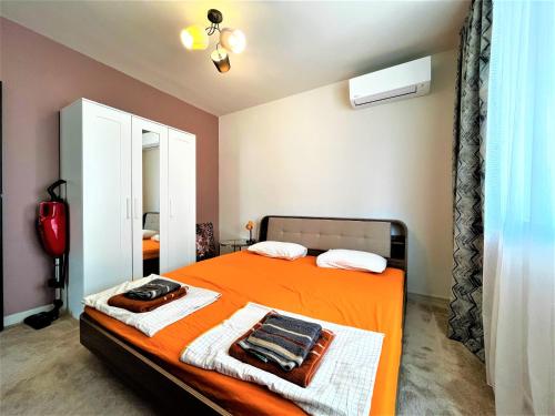 Postel nebo postele na pokoji v ubytování Bravo 5 Holiday Home