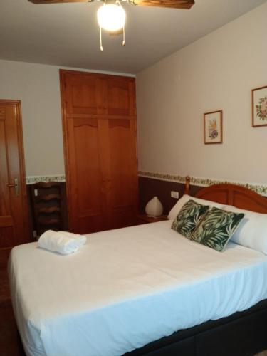 En eller flere senge i et værelse på El raconet del Riu