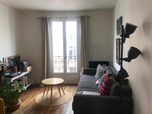 Χώρος καθιστικού στο Charming apartment in Montmartre
