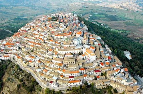 an aerial view of a town on a mountain at Azienda Agrituristica Il Pago in Nova Siri Marina