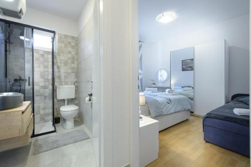 Kúpeľňa v ubytovaní Apartmani Tena