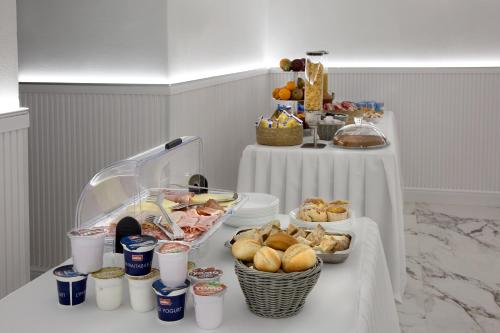 a table with a buffet of food and drinks on it at Palazzo Sant'Antonio in Naples