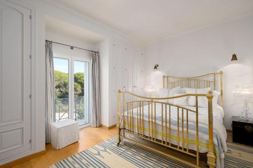 Postel nebo postele na pokoji v ubytování Villa Anna - Vale de Lobo