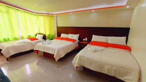 Katil atau katil-katil dalam bilik di Hostal La Siesta