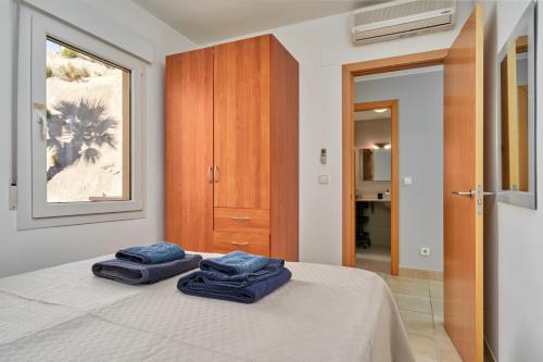 Ένα ή περισσότερα κρεβάτια σε δωμάτιο στο Apartamento Vistamar