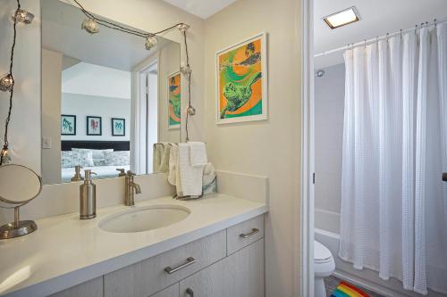 a bathroom with a sink and a mirror at Sealodge Villa H5 in Princeville