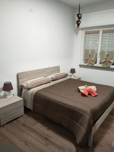 Säng eller sängar i ett rum på Casa Vacanze Celine a due passi dal mare