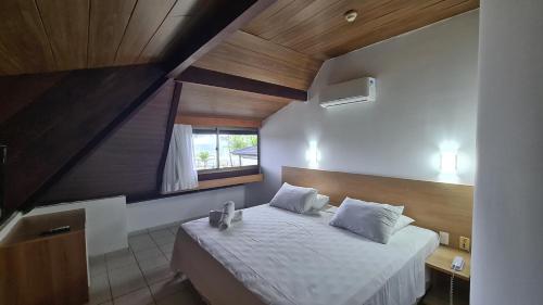 Ένα ή περισσότερα κρεβάτια σε δωμάτιο στο Beach Class Muro Alto by AFT