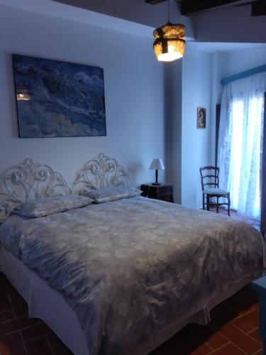 Postel nebo postele na pokoji v ubytování La Locanda n'gima all' ara