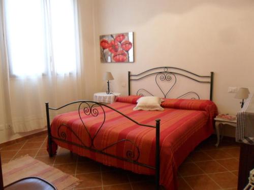 Una cama o camas en una habitación de Casa degli Ulivi 21