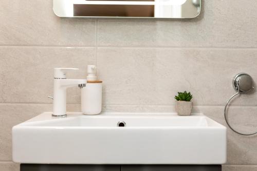 Bilik mandi di Apartments Neptun