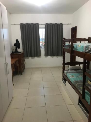 Postel nebo postele na pokoji v ubytování Casa em Resende-RJ