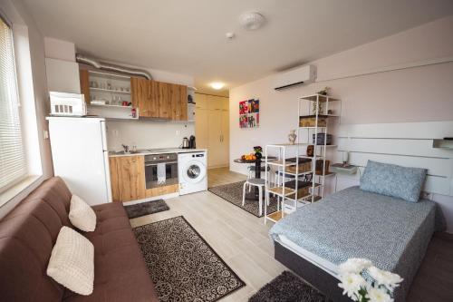 Η κουζίνα ή μικρή κουζίνα στο Paradise Guest Apartment