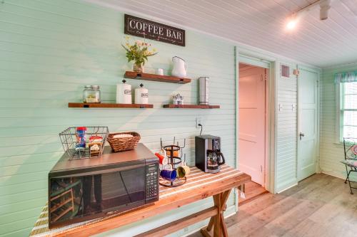 a kitchen with a counter with a microwave on a table at Vintage Corpus Christi Home - 2 Blocks From Beach! in Corpus Christi