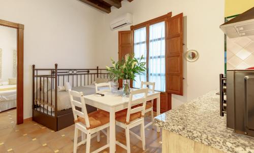 Katil atau katil-katil dalam bilik di SUITES CASA DE LAS COLUMNAS