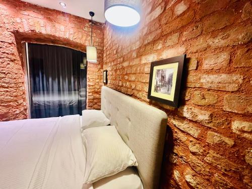 Ein Bett oder Betten in einem Zimmer der Unterkunft Taksim apartment