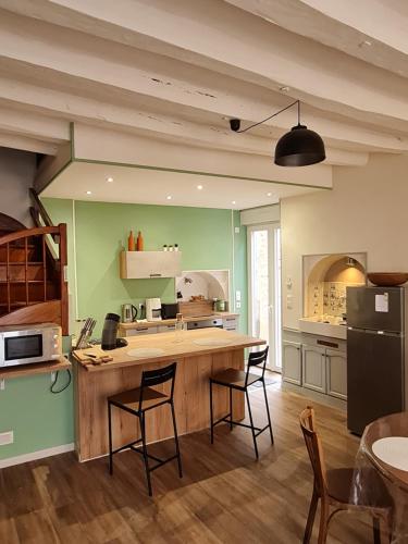 Dapur atau dapur kecil di Le Coeur de Fresnay