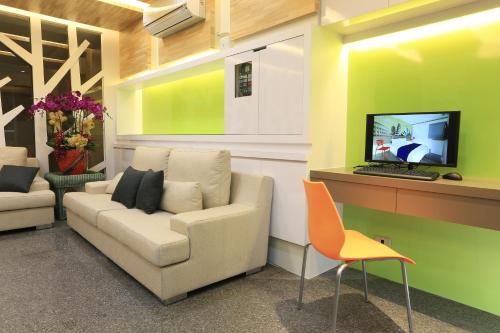 Posezení v ubytování Guo Chen Hotel