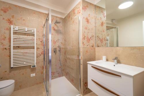 Kúpeľňa v ubytovaní Marinelli Apartments - La Meridiana