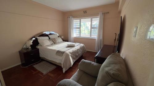 מיטה או מיטות בחדר ב-Rio Guest Accommodation