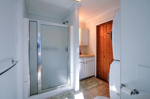a bathroom with a shower with a glass door at 10 Chadwell Avenue Sandwich - Cape Cod in Sandwich