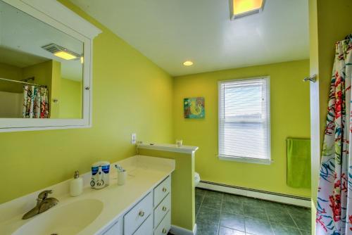 a bathroom with a sink and a mirror at 154 North Shore Boulevard East Sandwich - Cape Cod in East Sandwich