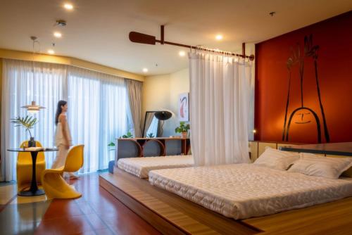 Postel nebo postele na pokoji v ubytování The Sóng Condotel in Vung Tau City - The Sóng Real Company