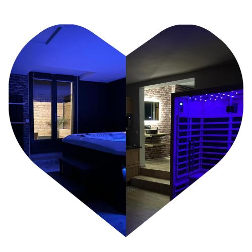 a room with a bed and a mirror at Le cocooning in Friaucourt
