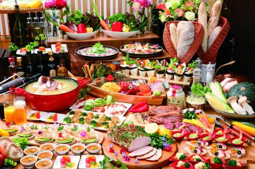 a buffet with lots of different types of food at The358 SORA in Fukuoka