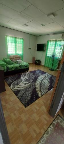 Ένα ή περισσότερα κρεβάτια σε δωμάτιο στο Hometostay Bokbak Kupang