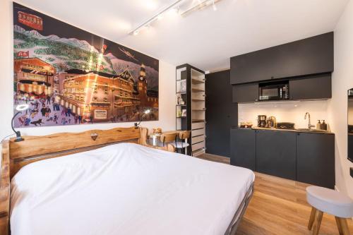 Posteľ alebo postele v izbe v ubytovaní Studio l'Orée - City centre - Megève