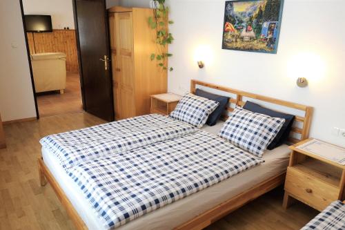 Postel nebo postele na pokoji v ubytování Apartma Andrej