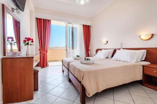 Postel nebo postele na pokoji v ubytování Lido Sofia Holidays