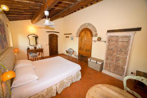 Postel nebo postele na pokoji v ubytování Agriturismo Macinello