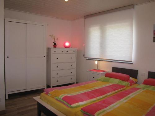 Ein Bett oder Betten in einem Zimmer der Unterkunft Fewo am Hochscheid