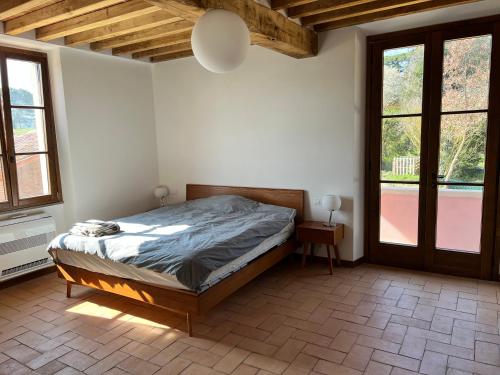 Lova arba lovos apgyvendinimo įstaigoje Casa Del Grifone, holiday home in Tuscany